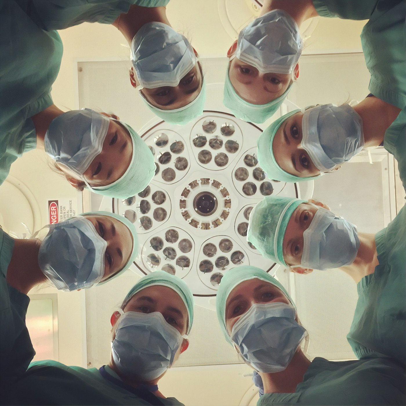 Medical team collaborating around a care plan